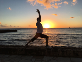 Sunset yoga class Waikiki Sans Souci beach in Honolulu with Tedd Surman